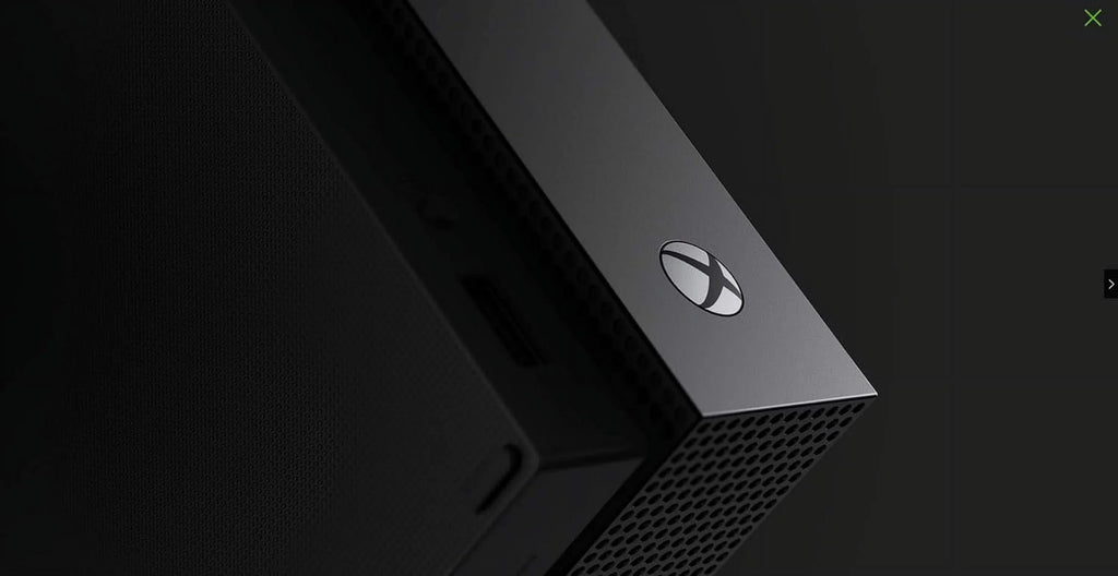Pre-Owned Microsoft Xbox One X 1TB Black Gaming Console With 2 Controller + G9 Earbuds With Microphone BOLT AXTION Bundle (Refurbished: Like New)